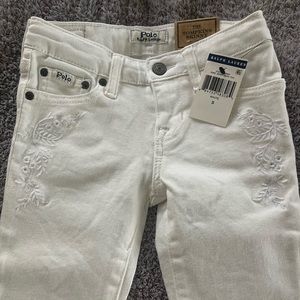 White skinny jeans with flower detail by Polo.